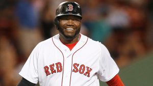 BOSTON, MA - JULY 1: David Ortiz #34 of the Boston Red Sox smiles as he leaves the field in the seventh inning against the Chicago Cubs at Fenway Park on July 1, 2014 in Boston, Massachusetts.  (Photo by Jim Rogash/Getty Images)